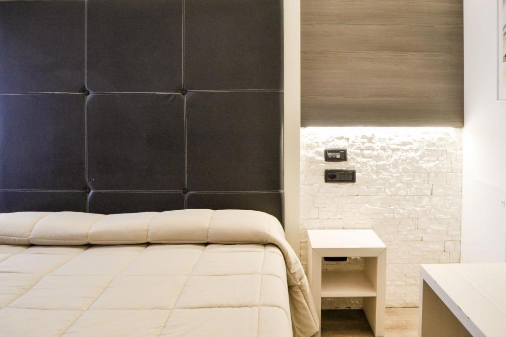 Postel nebo postele na pokoji v ubytování Planet Hotel