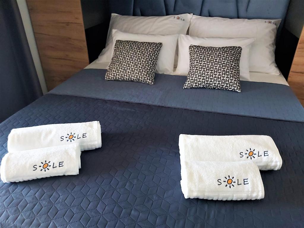 Postel nebo postele na pokoji v ubytování Mobile Home Sole