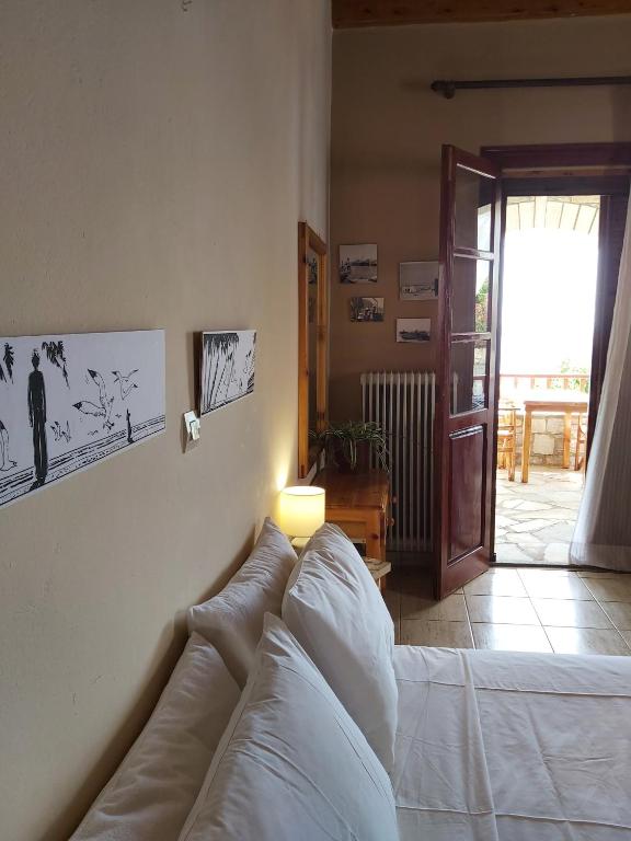 Postel nebo postele na pokoji v ubytování Almyra apt in Mani