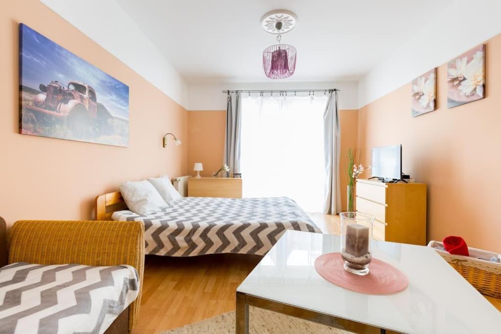 Posteľ alebo postele v izbe v ubytovaní Acacia city center apartment