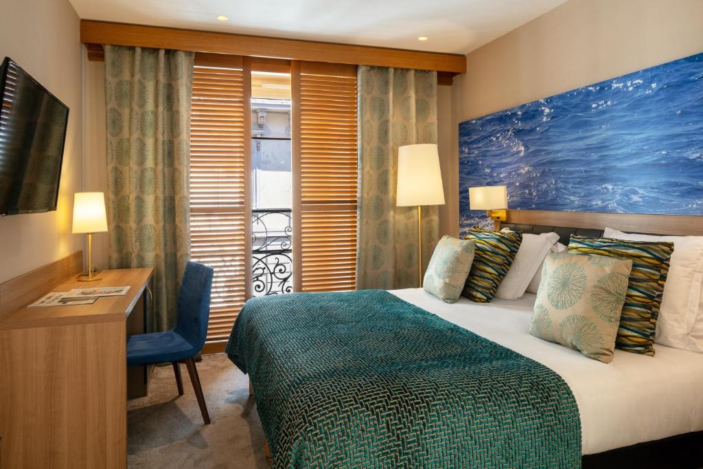 Cama ou camas em um quarto em Hotel Beau Rivage