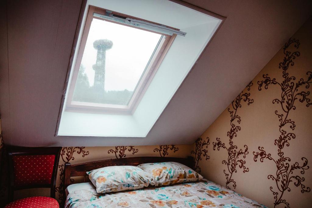 Postel nebo postele na pokoji v ubytování Tindioru Holiday House