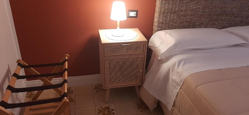 Łóżko lub łóżka w pokoju w obiekcie B&B villamariascauri