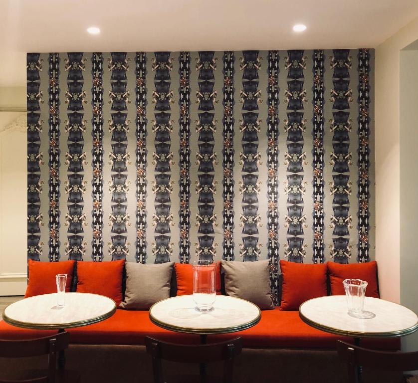 Posezení v ubytování Hôtel Le Mouton Bleu