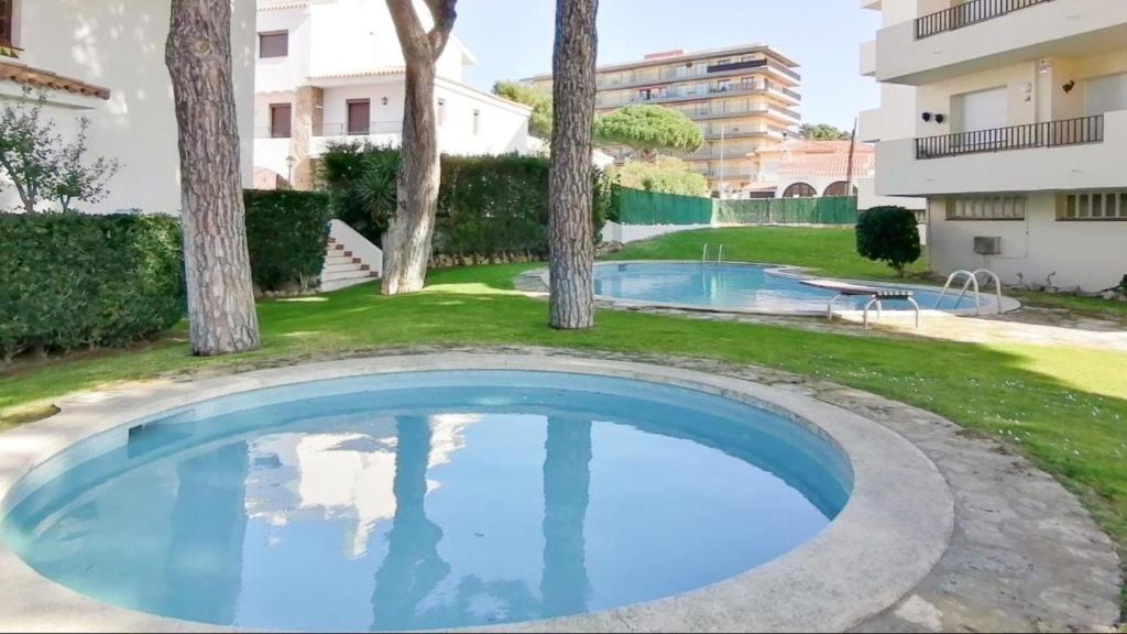 Bazén v ubytovaní VACAY Dúplex Gala, jardín, aire libre, sol, en la Costa Brava, L'Escala! alebo v jeho blízkosti