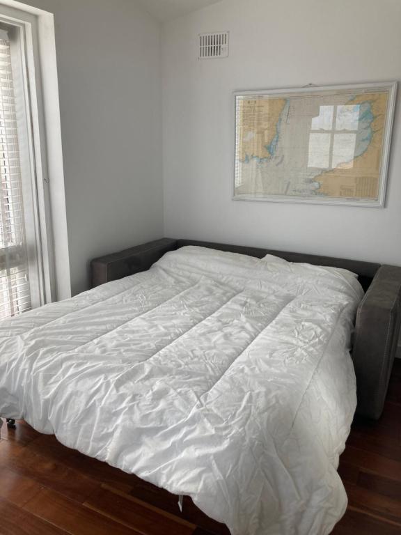 Postel nebo postele na pokoji v ubytování Sandy Cove