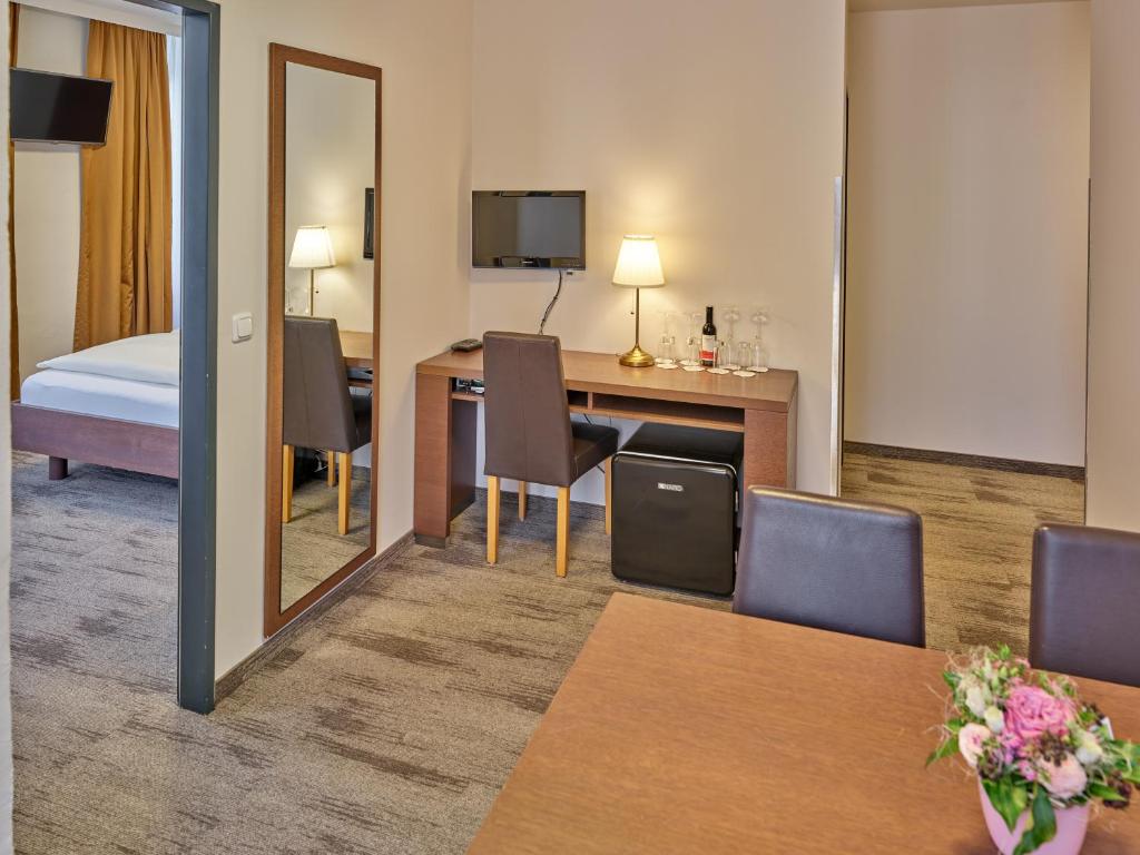 TV a/nebo společenská místnost v ubytování Stadthotel Schärding