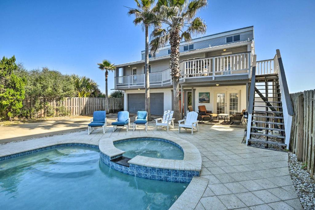 a house with a swimming pool in front of a house at Sunny Home with Decks and Views, Steps to Beach! in Flagler Beach