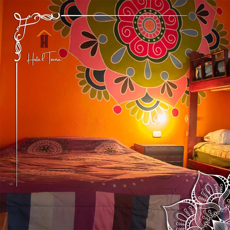Postel nebo postele na pokoji v ubytování Hostal Café Tiana