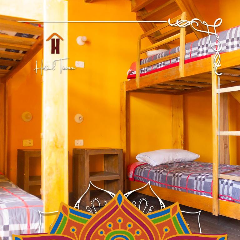 Postel nebo postele na pokoji v ubytování Hostal Café Tiana