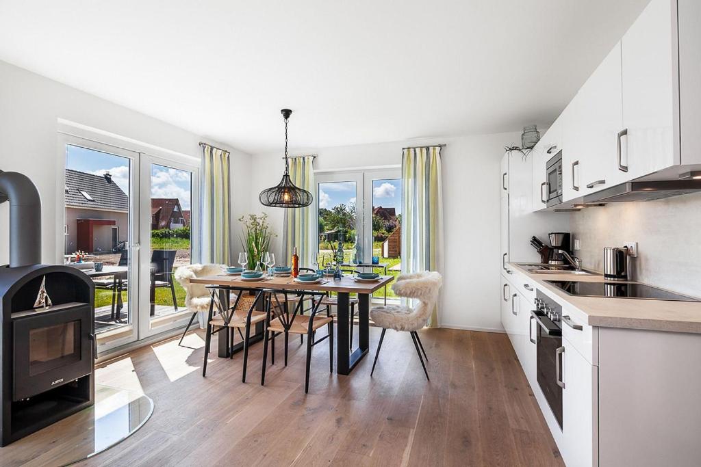 Kuchyň nebo kuchyňský kout v ubytování NordseeResort Büsum Ferienhaus 1 Beach House
