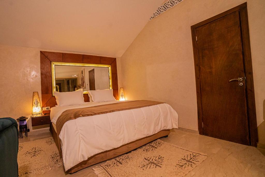 Postel nebo postele na pokoji v ubytování SUMAHAN SUITES & SPA