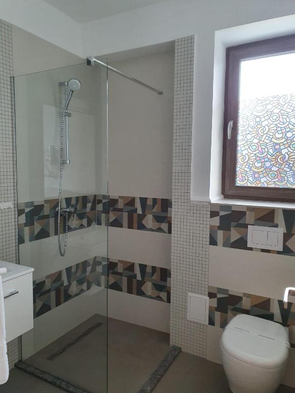 Koupelna v ubytování Hotel Scapino
