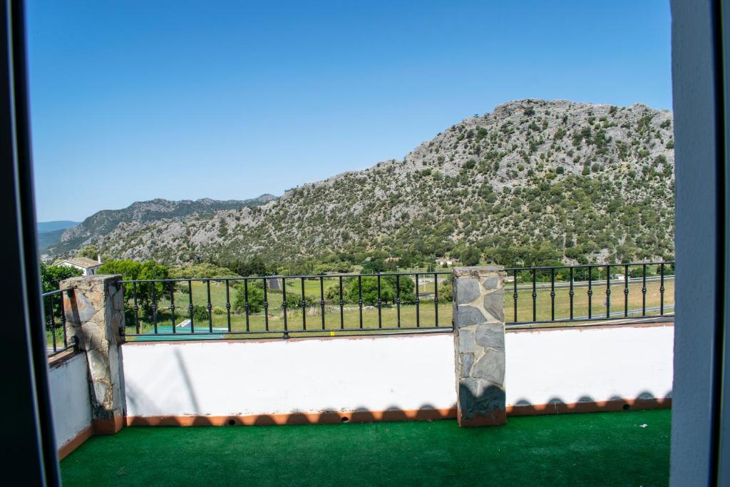 a view of a mountain from a balcony at Alojamiento Rural El Respiro "Brisa" in Benaocaz