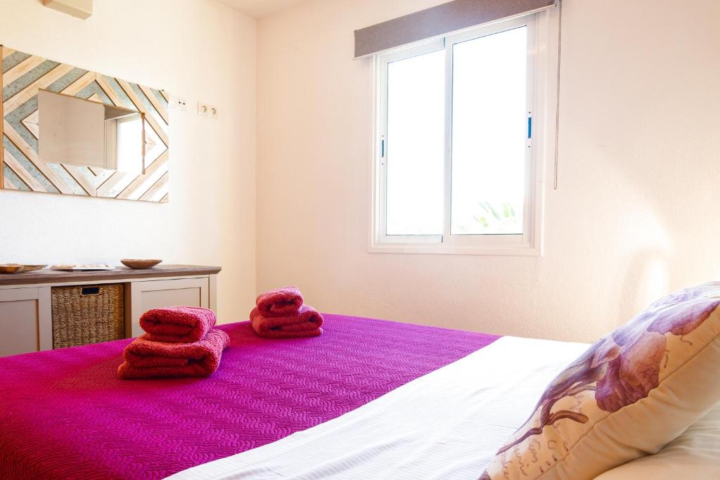 A bed or beds in a room at Attico Estrella