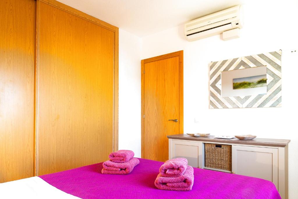 A bed or beds in a room at Attico Estrella