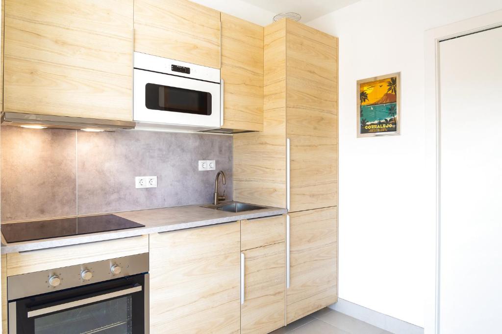 A kitchen or kitchenette at Attico Estrella