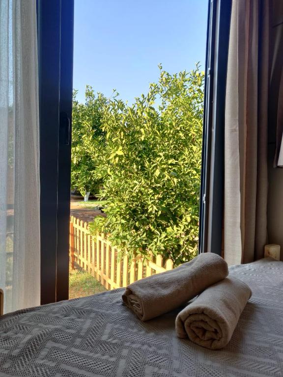 Postel nebo postele na pokoji v ubytování Gaia Tiny Houses Butik Hotel