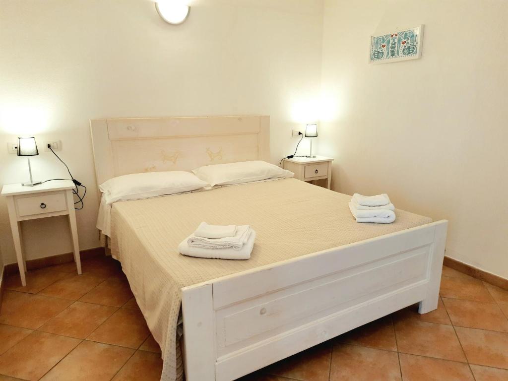 Postel nebo postele na pokoji v ubytování Agriturismo Orvile