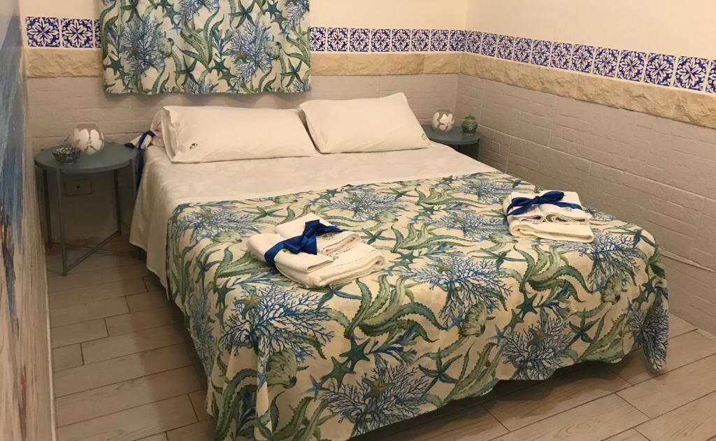 Letto o letti in una camera di B&B 091