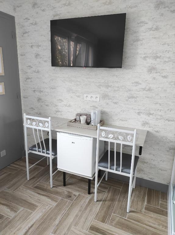 TV a/nebo společenská místnost v ubytování Chambre HORTENSIA