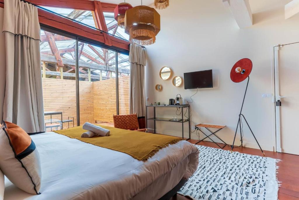 Posteľ alebo postele v izbe v ubytovaní Volubilis Luxury Guest House