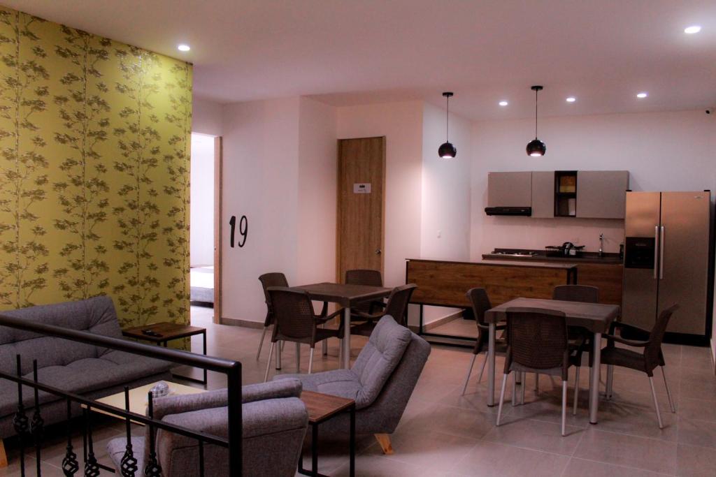 Kuchyň nebo kuchyňský kout v ubytování Ayenda Hotel MM