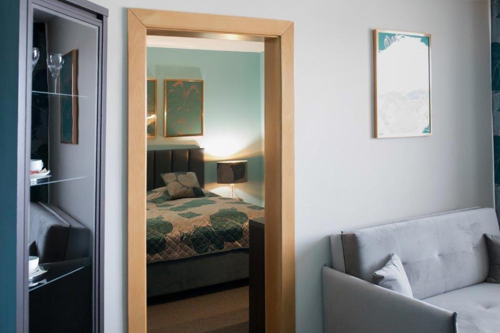Postel nebo postele na pokoji v ubytování Hotel Zlatý Býk