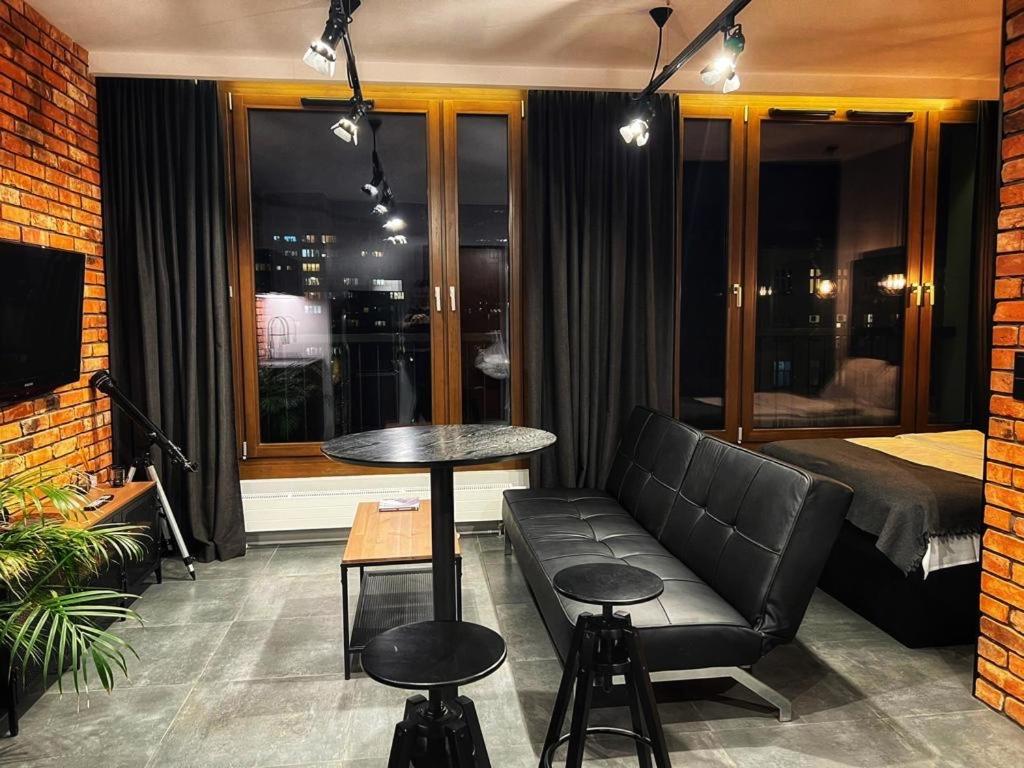 Posedenie v ubytovaní Loft Apartment Browary Warszawskie