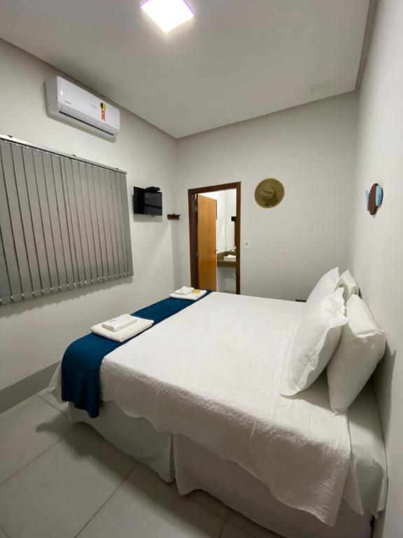 Кровать или кровати в номере Pousada Maktub