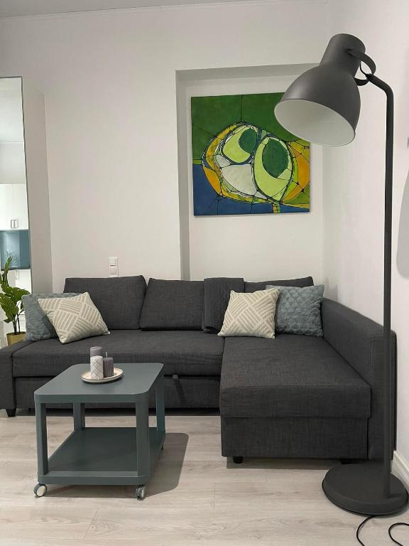 Posezení v ubytování Wspólna 54 - Blue - Good Apartments