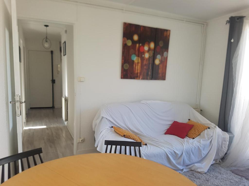 Cama ou camas em um quarto em Logement entier - Appartement T4 hypercentre dans une rue calme - Stationnement gratuit