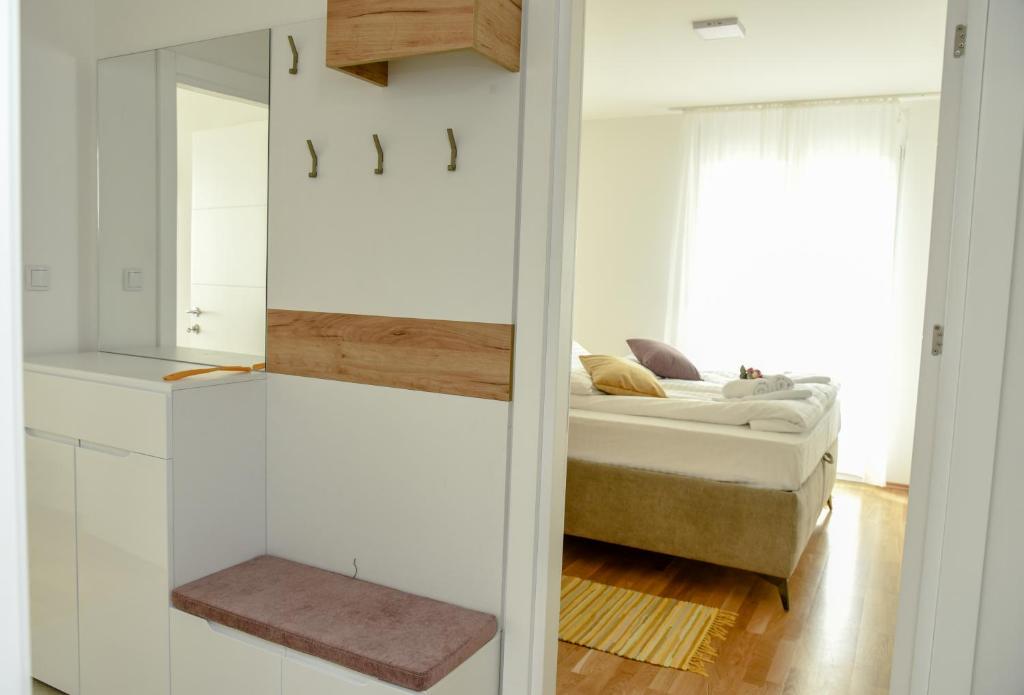 Krevet ili kreveti u jedinici u okviru objekta Suncokret Apartmani Loznica