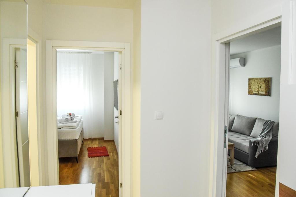 Krevet ili kreveti u jedinici u okviru objekta Suncokret Apartmani Loznica