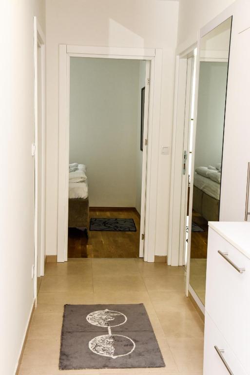 Krevet ili kreveti u jedinici u okviru objekta Suncokret Apartmani Loznica
