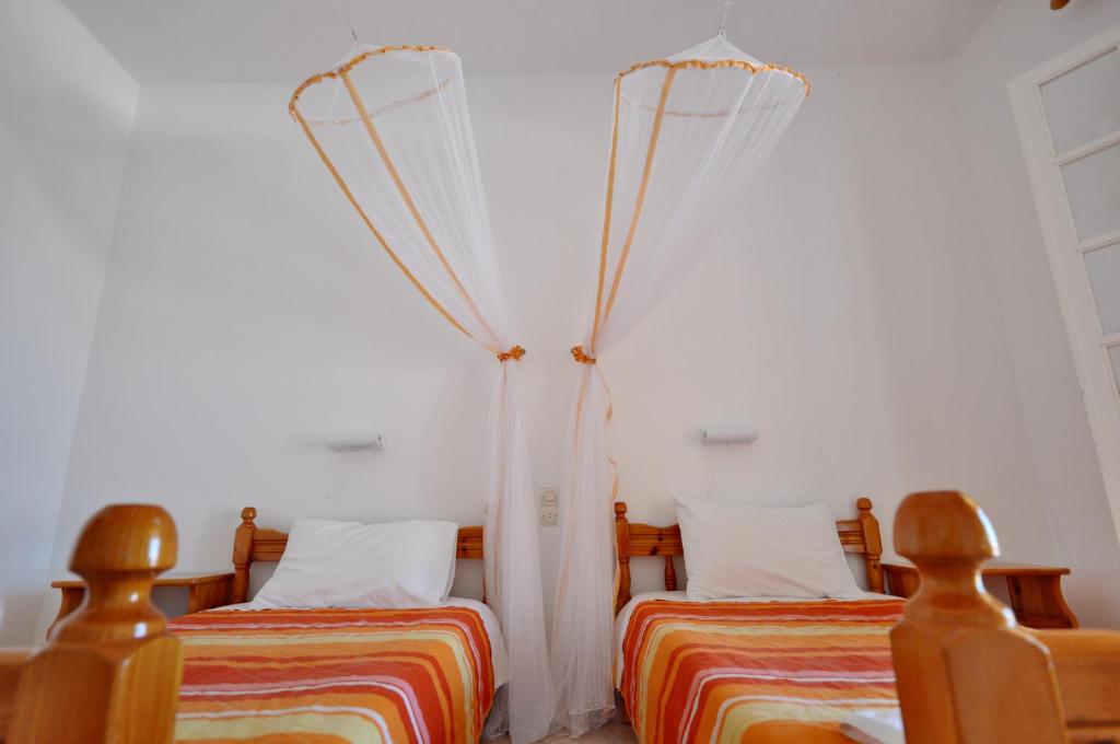Postel nebo postele na pokoji v ubytování Miranda Haus