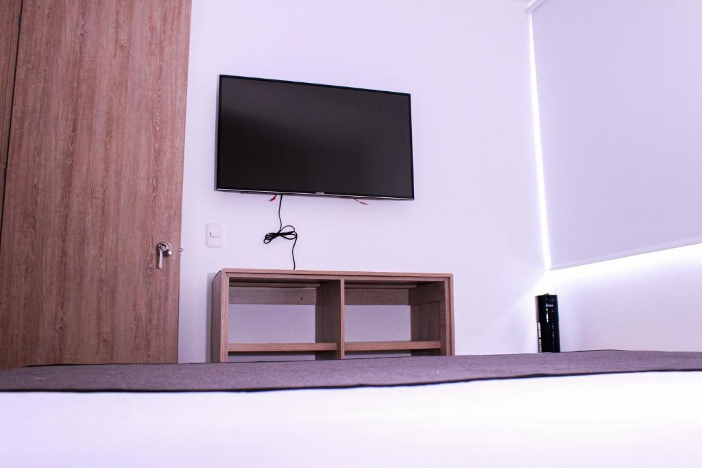 TV a/nebo společenská místnost v ubytování Ayenda Hotel MM