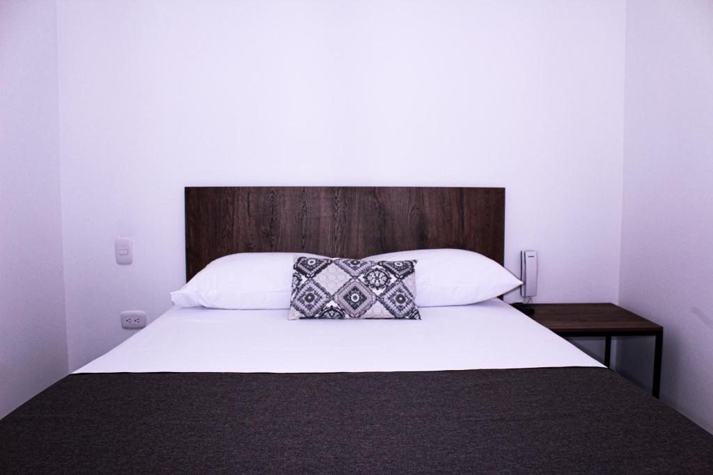 Postel nebo postele na pokoji v ubytování Ayenda Hotel MM
