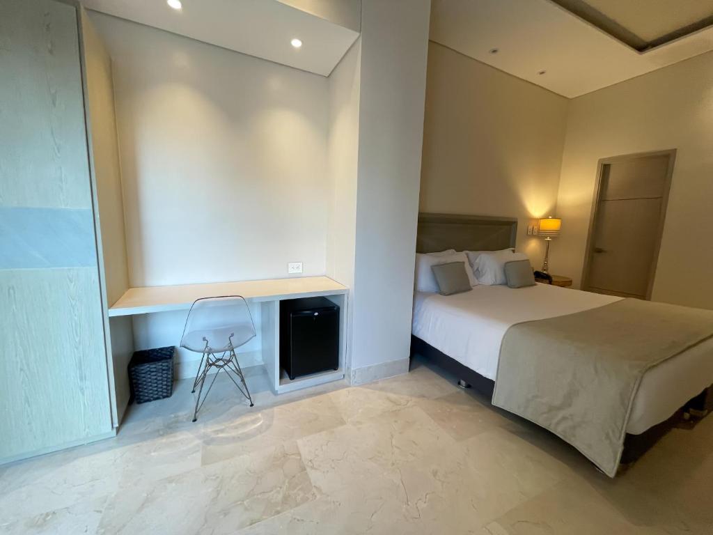 Postel nebo postele na pokoji v ubytování Hotel Boutique Maree