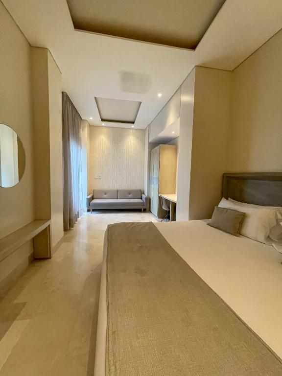 Postel nebo postele na pokoji v ubytování Hotel Boutique Maree