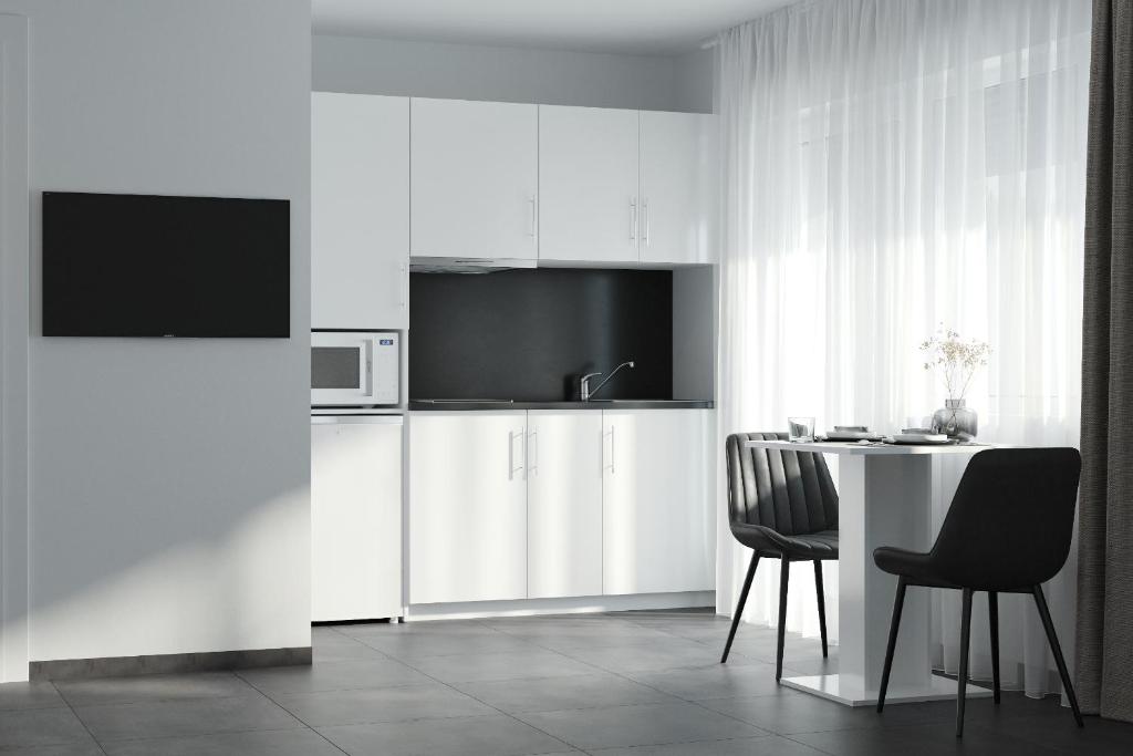 Kuchyň nebo kuchyňský kout v ubytování The Residences - Apartments Frankfurt