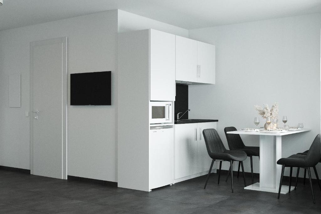 Kuchyň nebo kuchyňský kout v ubytování The Residences - Apartments Frankfurt