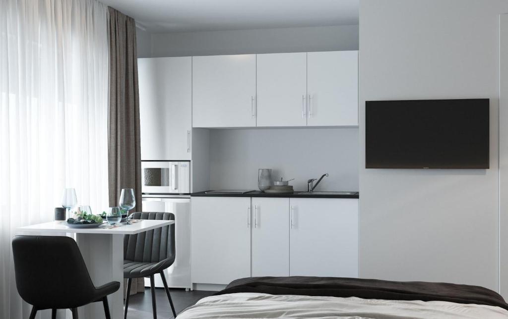 Kuchyň nebo kuchyňský kout v ubytování The Residences - Apartments Frankfurt