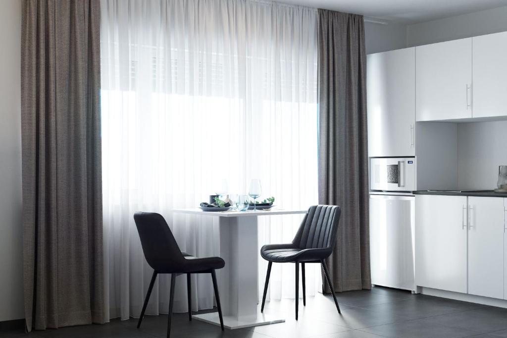 Kuchyň nebo kuchyňský kout v ubytování The Residences - Apartments Frankfurt