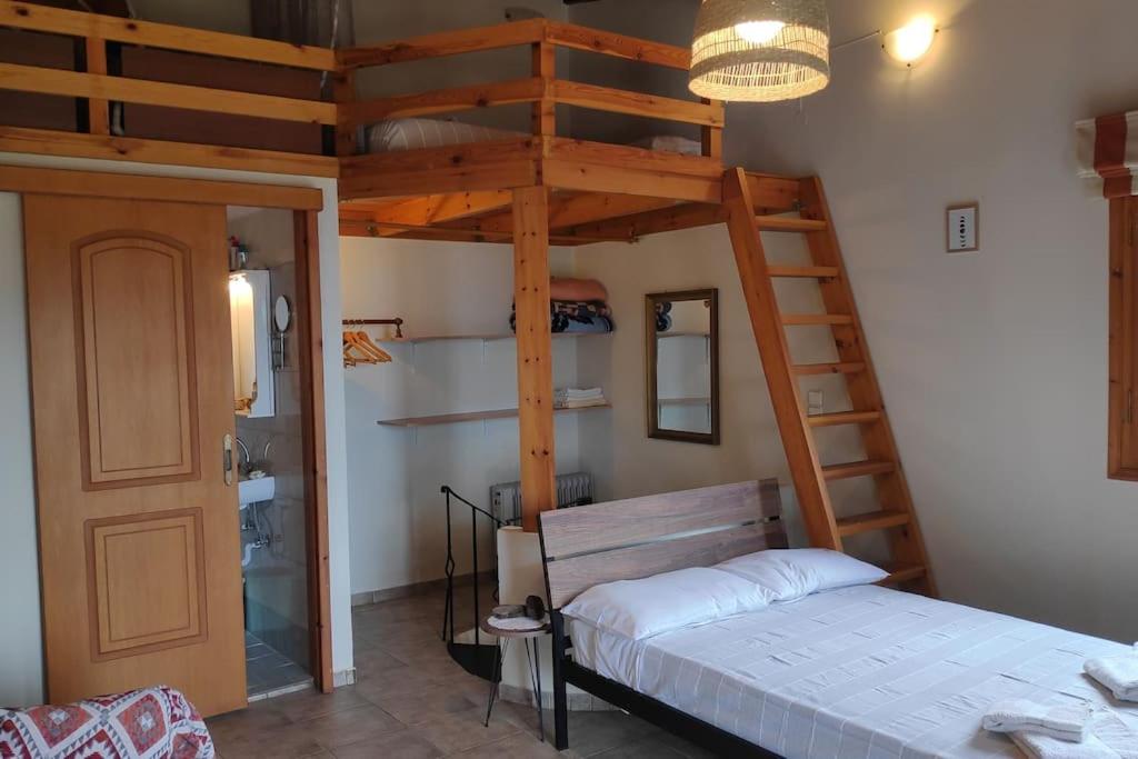 Postel nebo postele na pokoji v ubytování Stefanis traditional house - Kampos