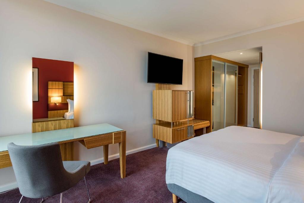Postel nebo postele na pokoji v ubytování Radisson Blu Hotel London Stansted Airport