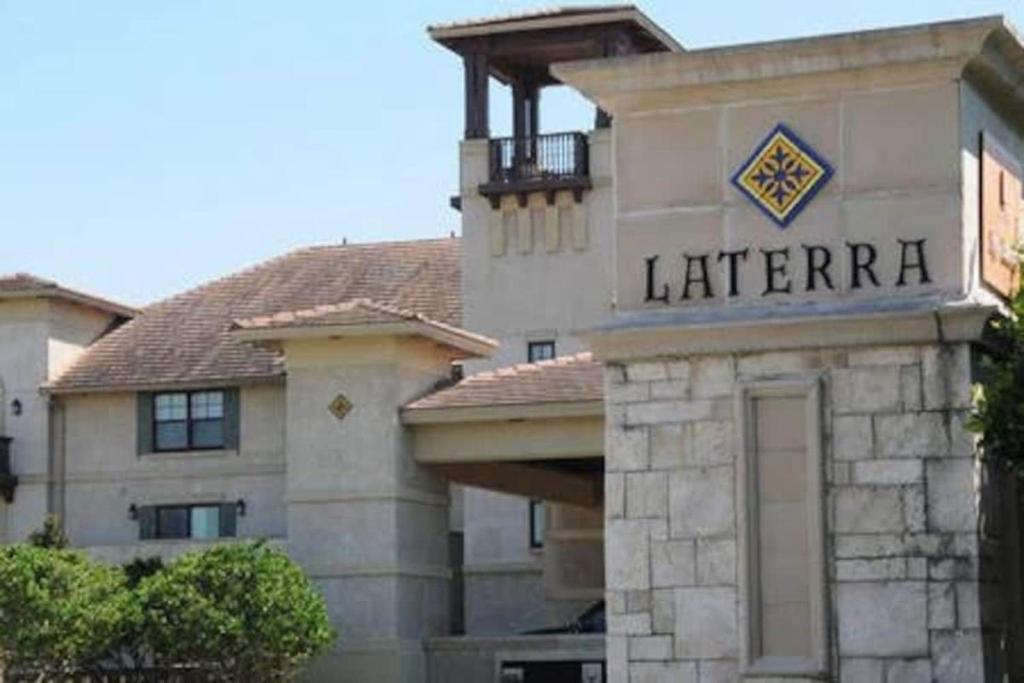 a large building with a sign for a library at Luxury Golf Retreat in Saint Augustine