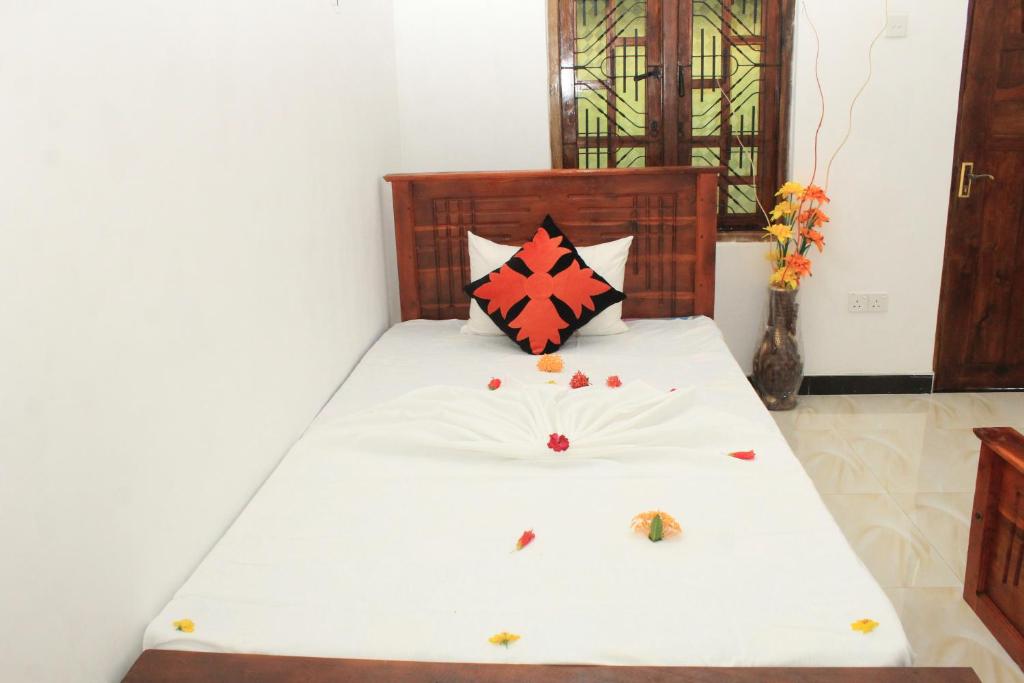 Postel nebo postele na pokoji v ubytování Sigiriya Hillside View Villa