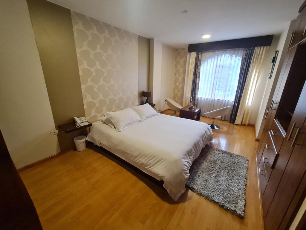 Postel nebo postele na pokoji v ubytování Hotel Ficoa