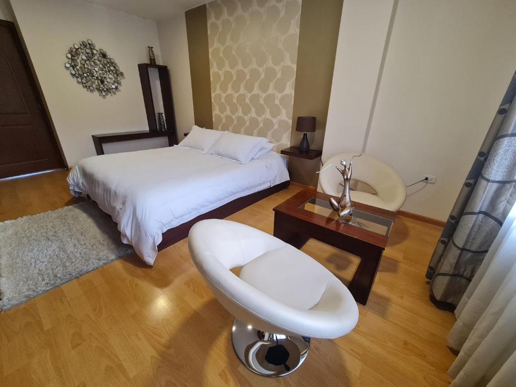Postel nebo postele na pokoji v ubytování Hotel Ficoa